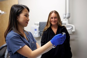 Dr. Yang with a patient